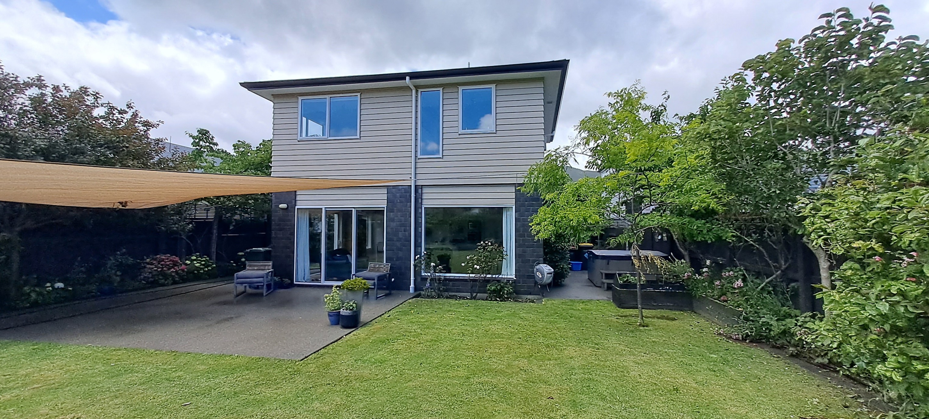 Two-storey house backyard